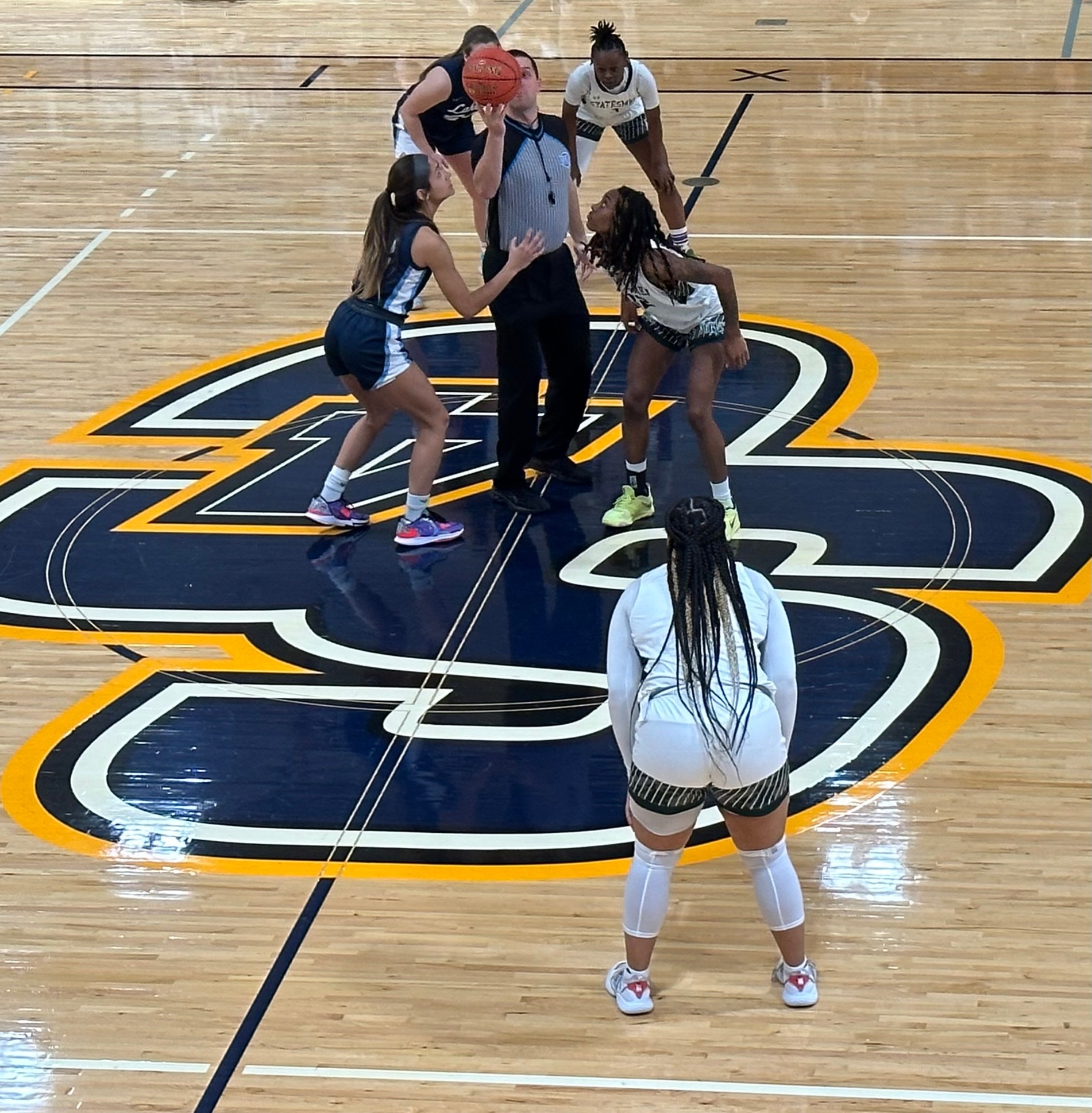Image of Satori Griffin at midcourt for tip-off